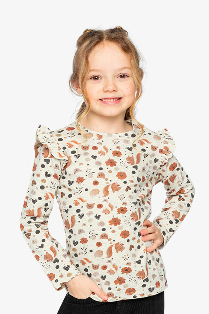 Child wearing Deux par Deux long sleeve organic cotton tee, beige squirrel print, lookbook view 1