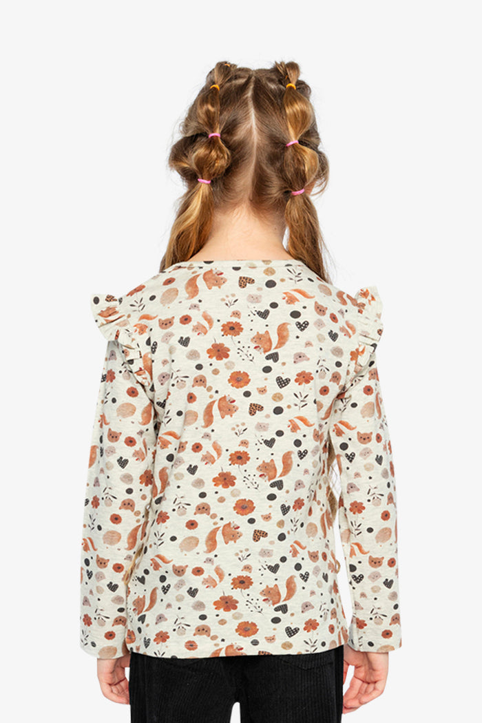 Child wearing Deux par Deux long sleeve organic cotton tee, beige squirrel print, lookbook view 3