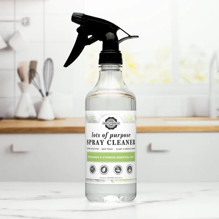 Rustic Strength, Lots of Purpose Spray Cleaner, Lifestyle image setting on a marble countertop in a white-dominant kitchen