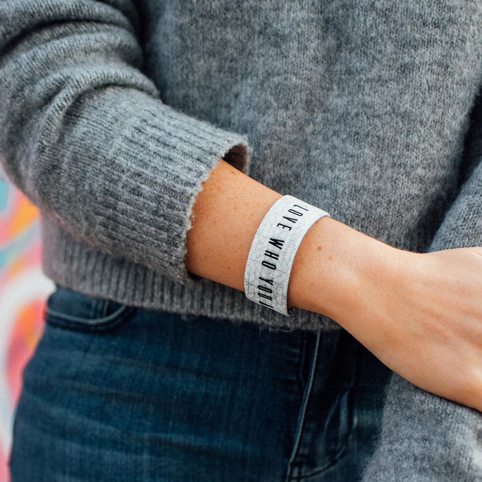 Lifestyle close up of Love Who You Are on someone's wrist