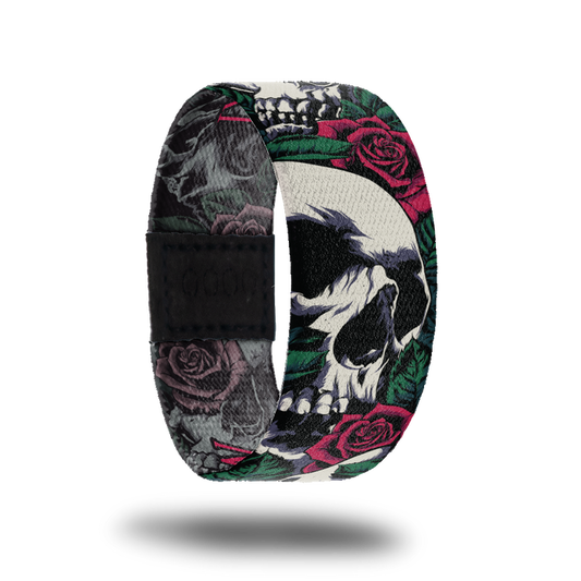 Outside design for Memento Mori. Illustrated realistic white skulls with red roses and green leafs