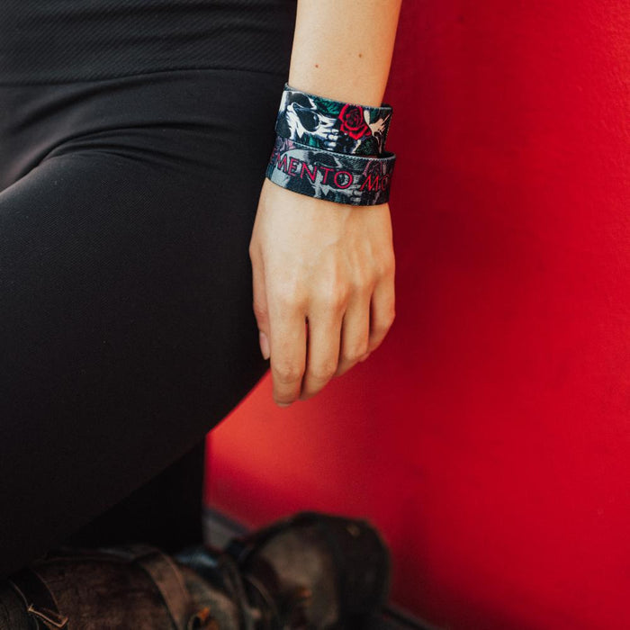 Lifestyle close up image of model's wrist wearing 2 Memento Mori straps