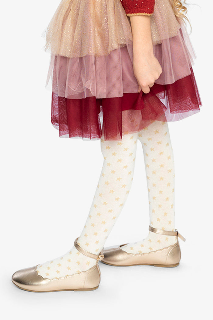 Lookbook: child in the red, pink and beige tiered skirt by Deux par Deux