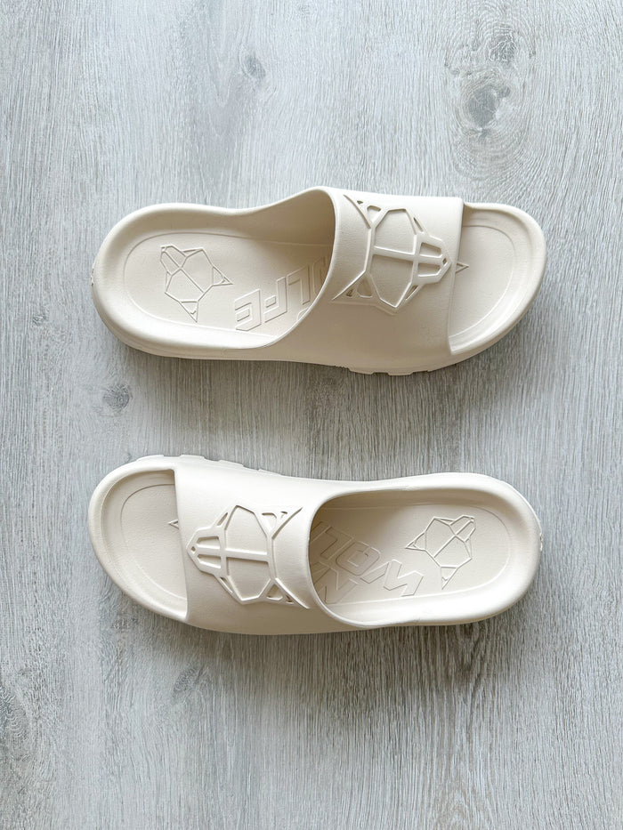 NAKED WOLFE Tommy Stone Cream Waterproof Wolf Embossed Sandals Slide - House Of Huntington