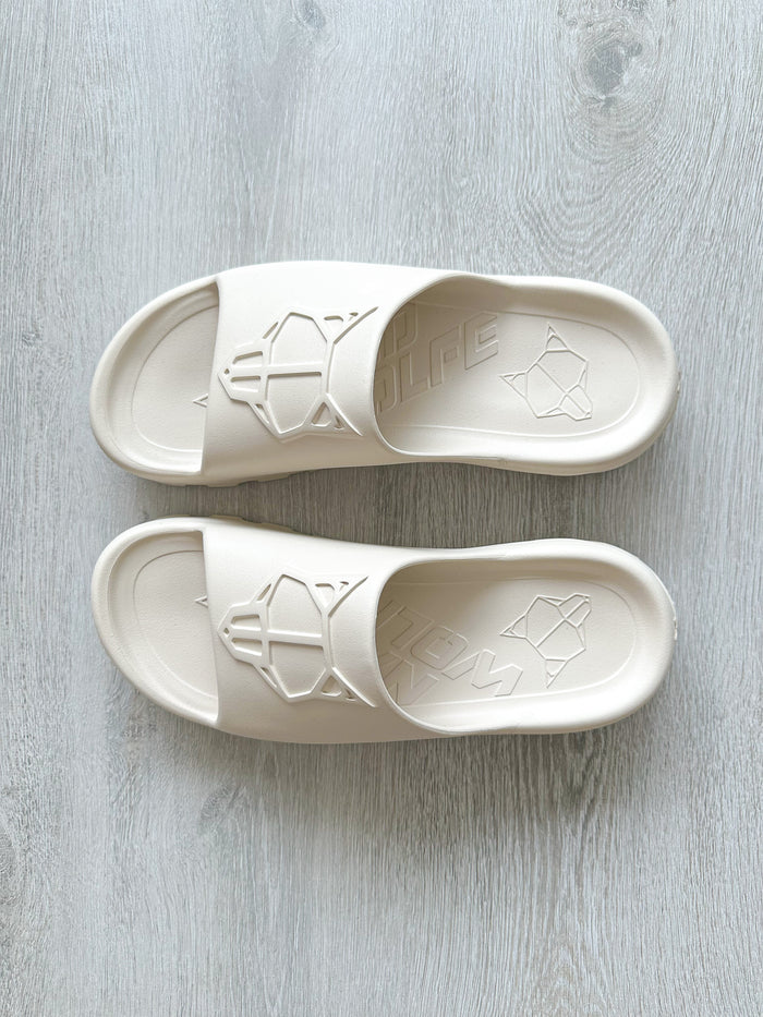 NAKED WOLFE Tommy Stone Cream Waterproof Wolf Embossed Sandals Slide - House Of Huntington