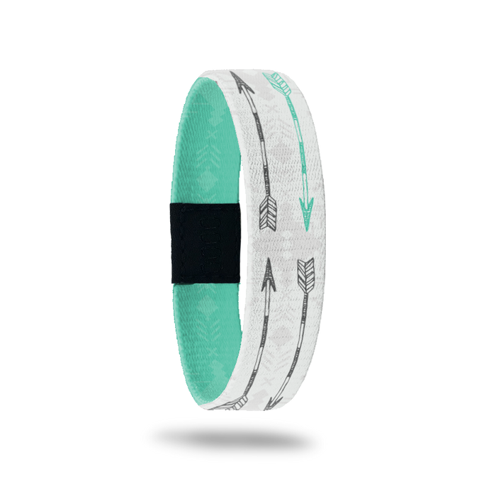 Outside Design of Never Give Up: white and light grey tribal design with grey and turquoise arrows overlaying
