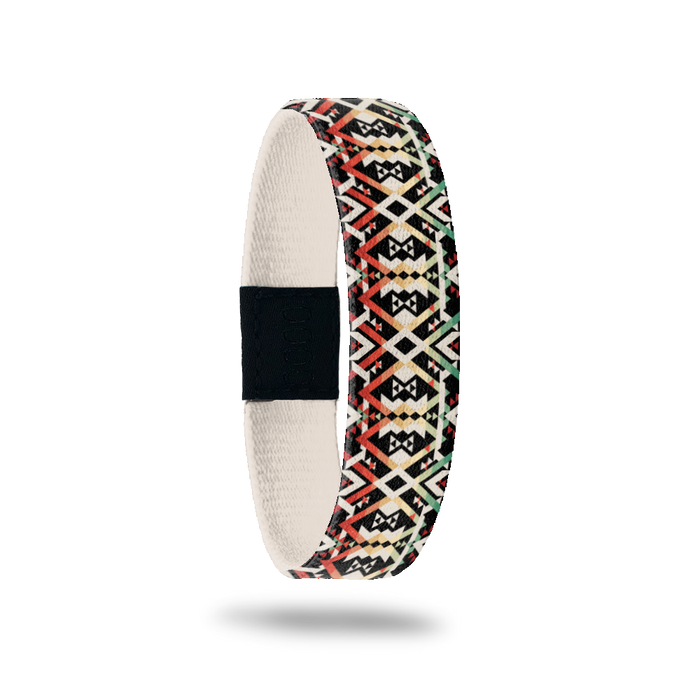 Outside Design of Never Surrender: tan, red, yellow, and green tribal design