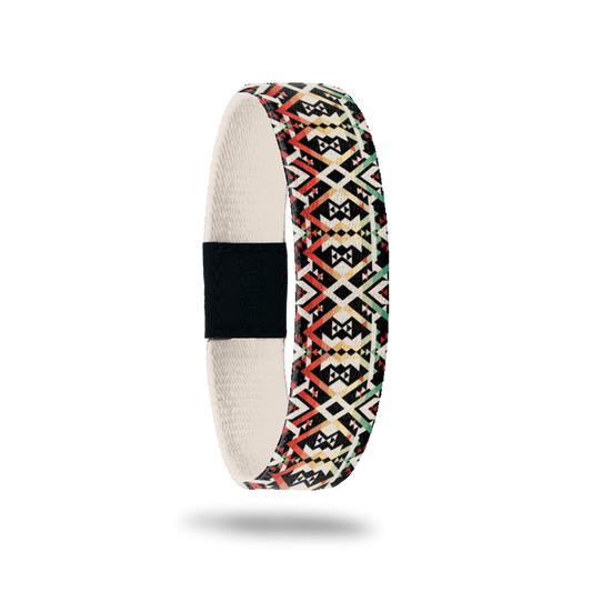 Outside Design of Never Surrender: tan, red, yellow, and green tribal design