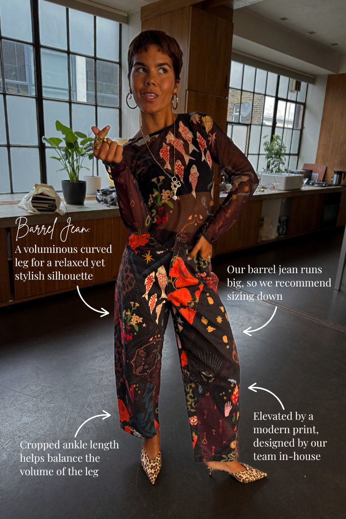 Black Night Garden Barrel Jeans with a mixed print and voluminous silhouette, with annotations on the relaxed, cropped fit.