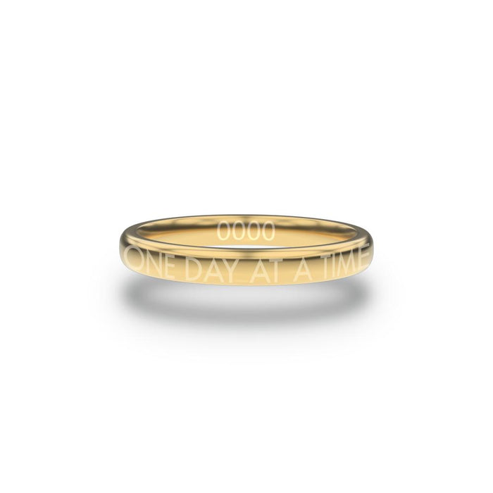 Front design of One Day At A Time gold ring with sketched in text ‘One Day At A Time’