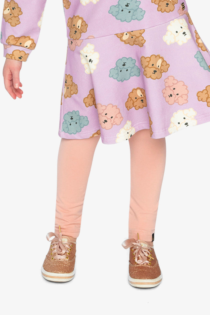 Lookbook: child wearing the Deux par Deux pink organic cotton leggings