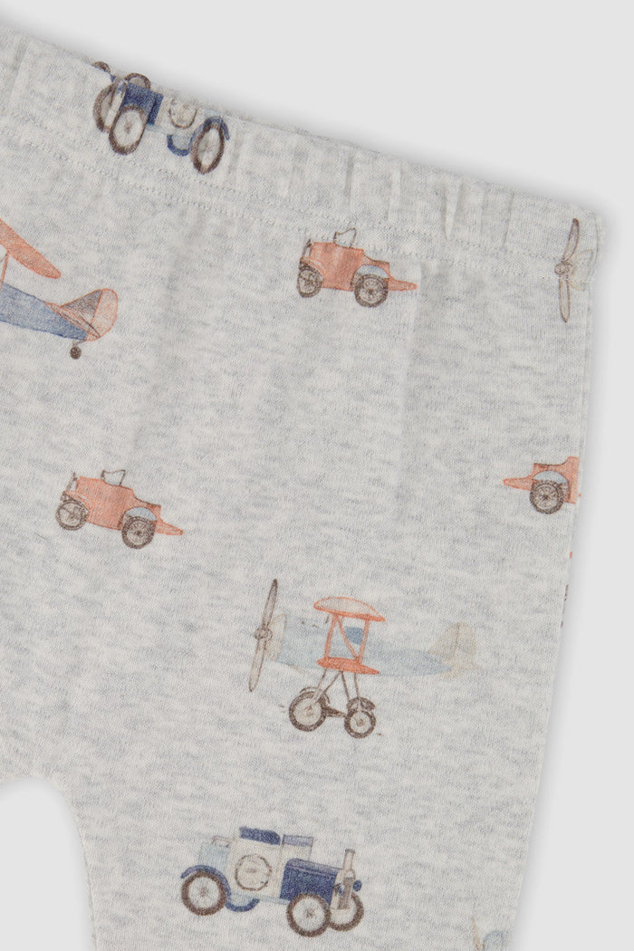 Close-up detail of the Deux par Deux top and pants set in beige vintage airplane print, view 5