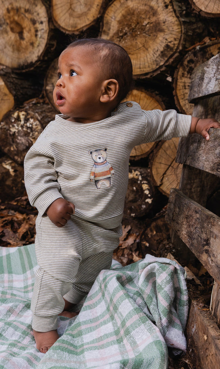 Baby wearing the Deux par Deux top and pants set in brown and off-white stripes, view 2