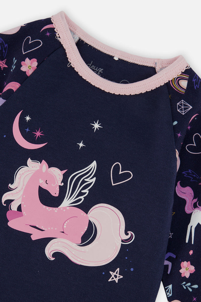 Close-up detail of the purple unicorn print two-piece pajama set by Deux par Deux
