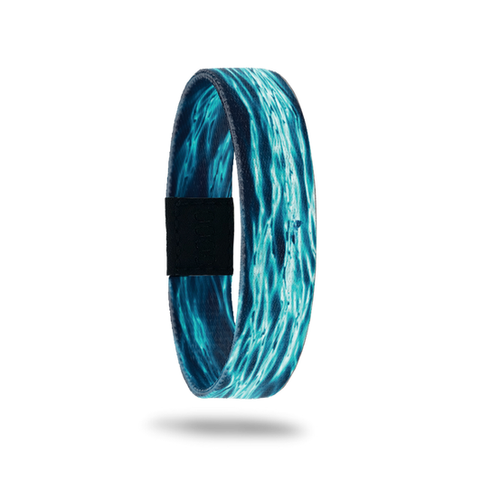 Wristband single with navy base and bright blue/white water reflections. The inside is the same design and reads Persistence.