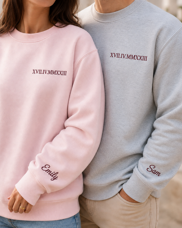 charcoal sweatshirt with embroidered couple's date and personalised sleeve name