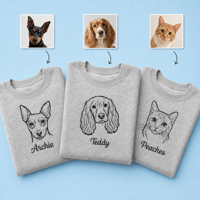 navy sweatshirt with embroidered pet portrait line drawing and pet name on chest