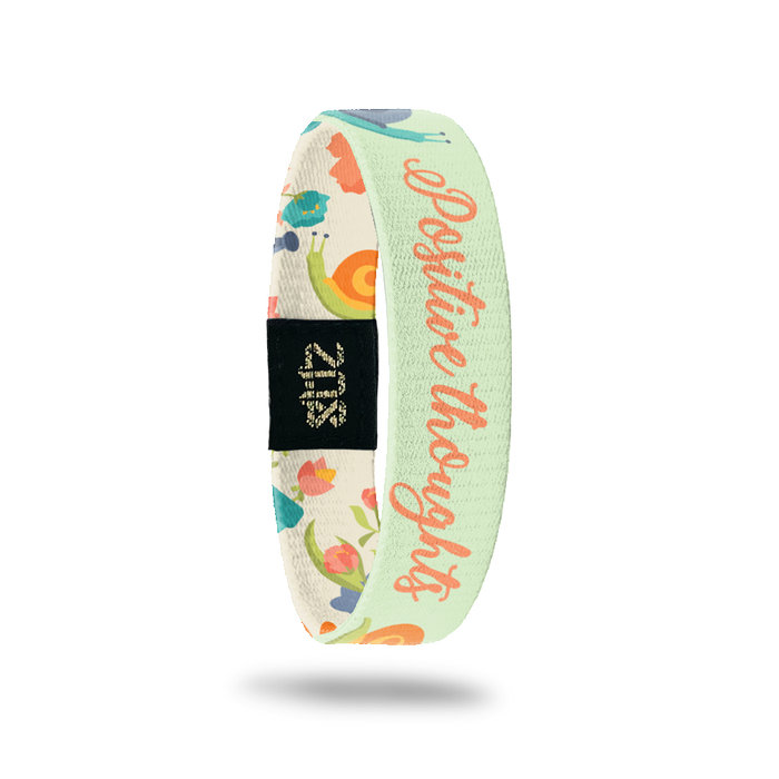 Inside Design of Positive Thoughts: tan background with drawn snails and coral text in the middle ‘Positive Thoughts’