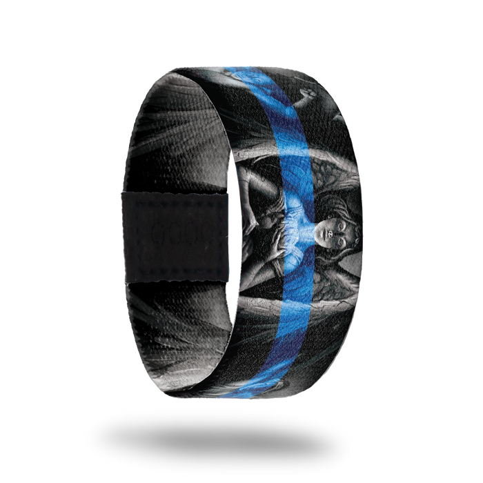 Outside design of Protector, gray scale statue of an angel in the center and two other angels next to the centered angel with a black background. With a blue transparent line centered across the design.