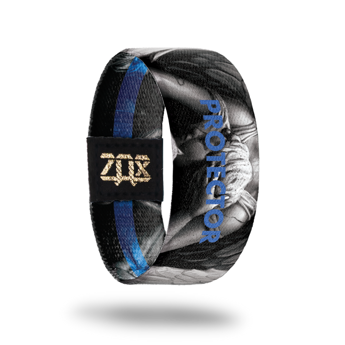 Inside design of Protector, grayscale angel in the center of black background with Protector in blue transparent text over the angel
