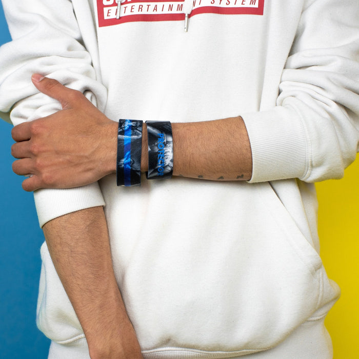 Studio close up image of 2 Protector on someone's wrist