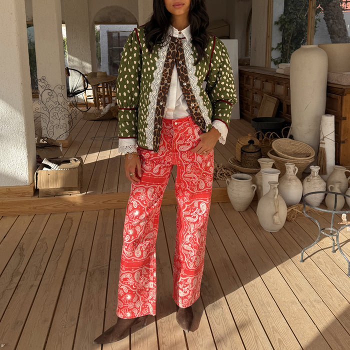 Red Bandana Jeans Petite with a straight leg and white paisley print, styled with a patterned green quilted jacket.