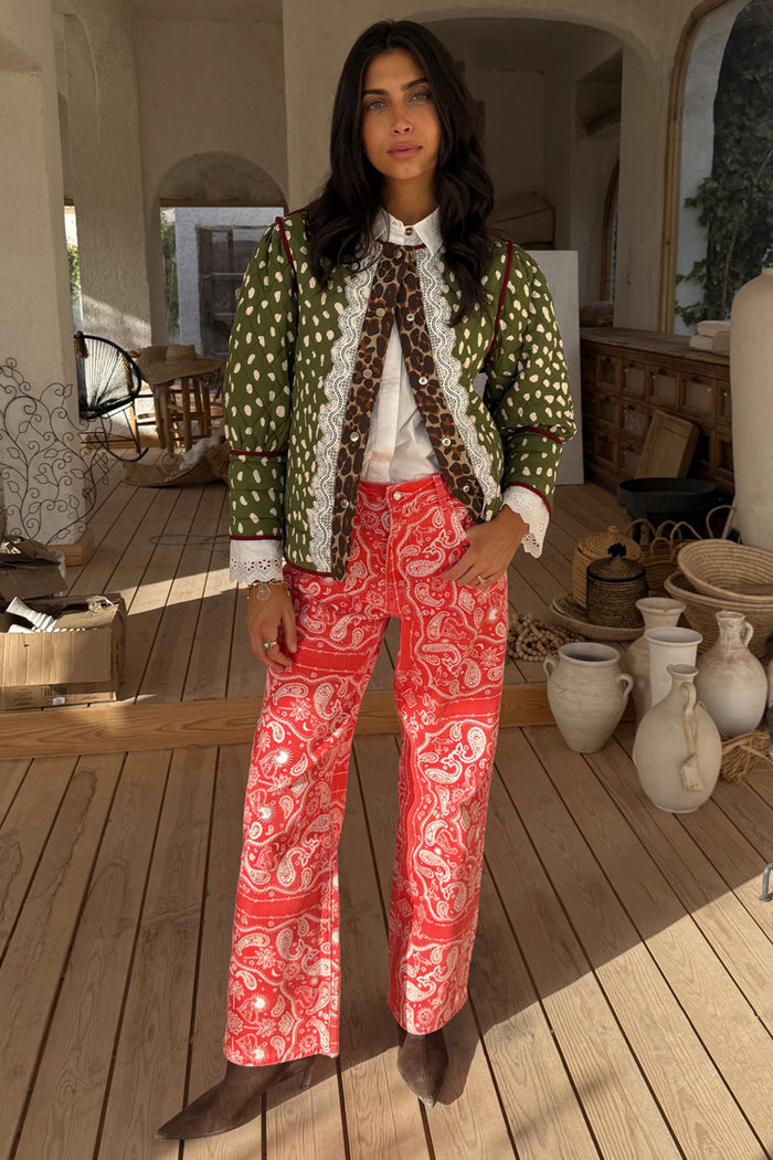 Iconic Red Bandana Jeans Petite in straight leg denim with a white paisley print, styled with a quilted jacket.