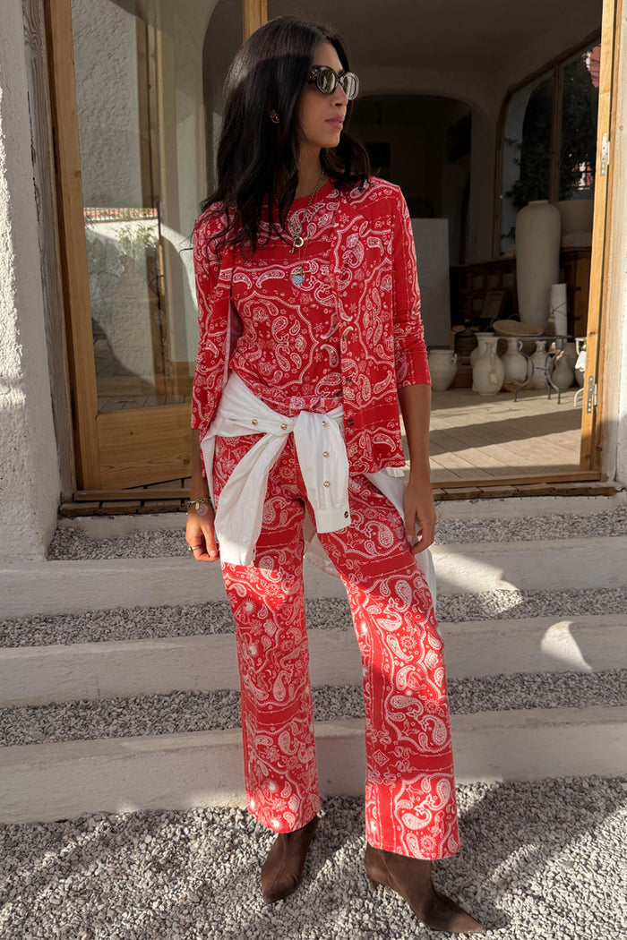 Red Bandana Jeans Petite in a straight leg denim with a matching print top and white shirt tied at the waist.