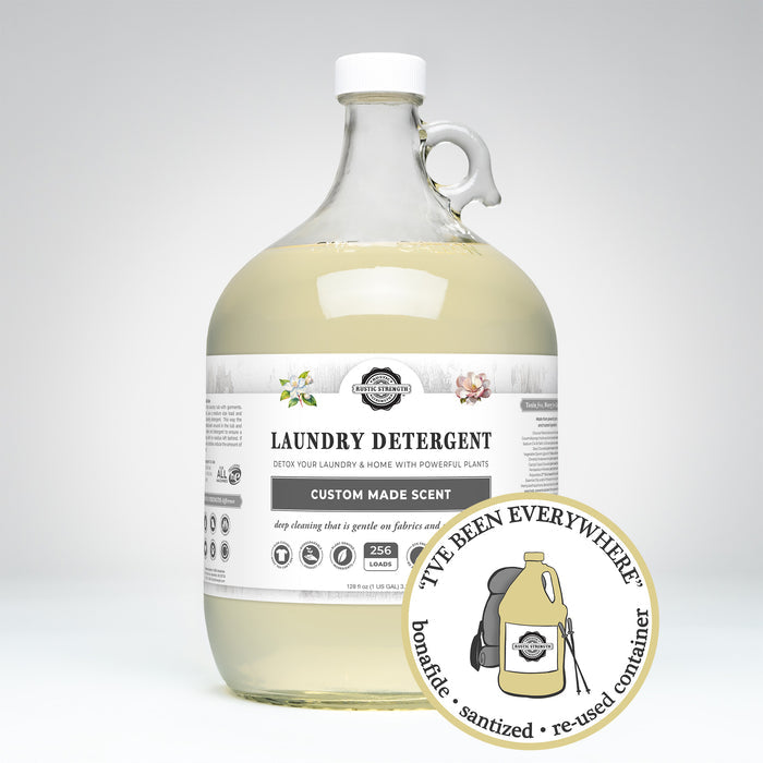 Rustic Strength, Laundry Detergent, 1 Gallon, Glass Jug, Jasmine & Magnolia, with image "I've been everywhere - Bonafide, Sanitized, Re-used Container"