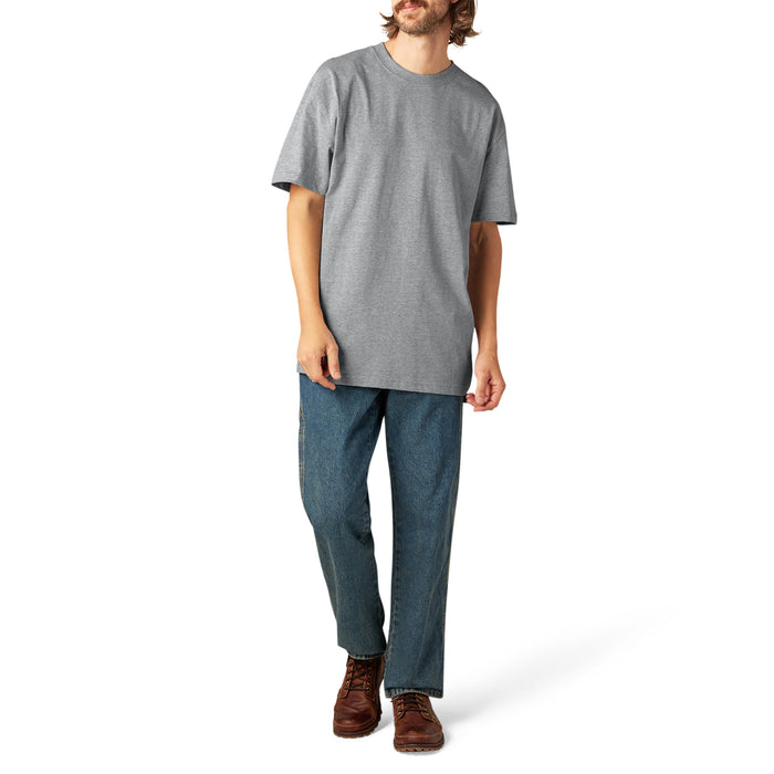 Gray short-sleeve crew neck t-shirt on model wearing blue jeans and brown lace-up boots.