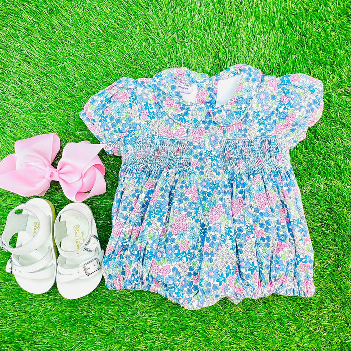 Peter pan collar and sweet smocking are timeless details at an affordable price. Perfect for achieving Princess Charlotte style for less.