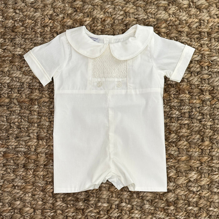 collared heirloom hortall for babies, predominantly white in color, with short sleeves and decorative stitching details.