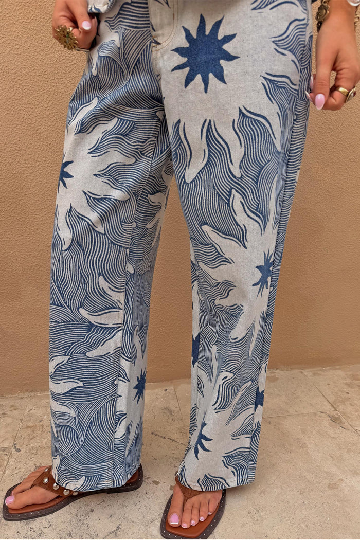 Blue Soleil Jeans with a sun motif and line print in a relaxed straight-leg denim fit.