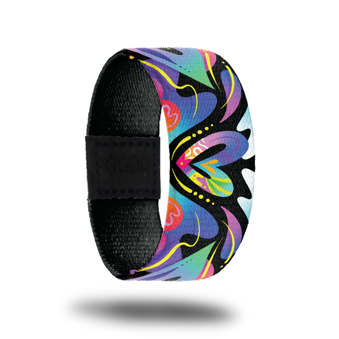 Outside design for Spread Love. Colorful blend of colors with different shapes and a heart shape in the center of the design