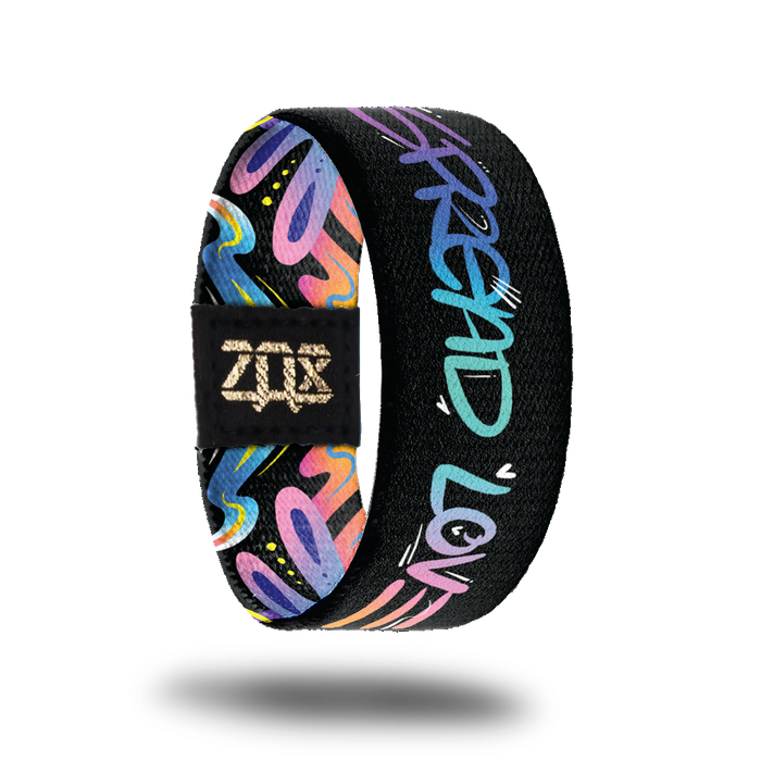 Inside design for Spread Love. Black background with Spread Love in blended colors