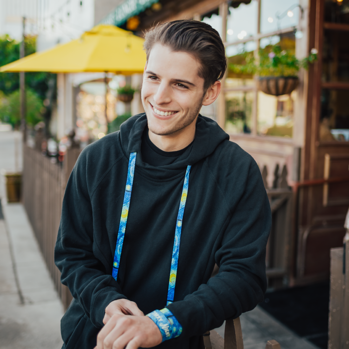 Lifestyle image of model wearing a Zox hoodie with Starry Night string
