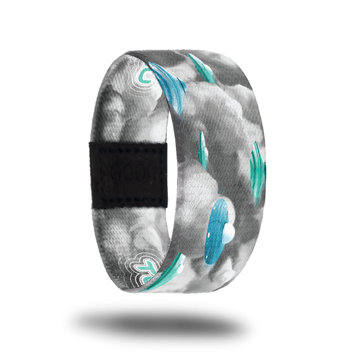 1 of 3 possible outside designs for Take Me With You. Grey clouds with blue ufo space ships