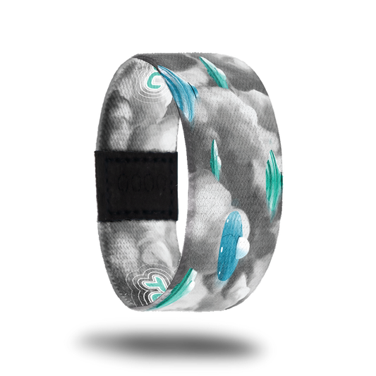 1 of 3 possible outside designs for Take Me With You. Grey clouds with blue ufo space ships