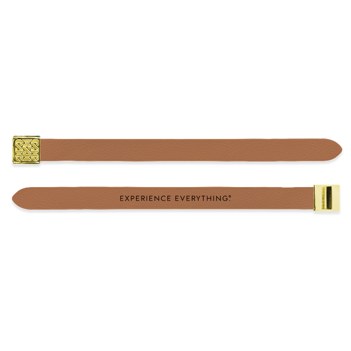 Outside Design of the V2 Imperial Tan Solid: vegan leather material with printed on tan background and gold buckle clasp. And Inside Design of the V2 Imperial Tan Solid: vegan leather material with printed on tan background with black text ‘Experience Everything’ and gold buckle clasp
