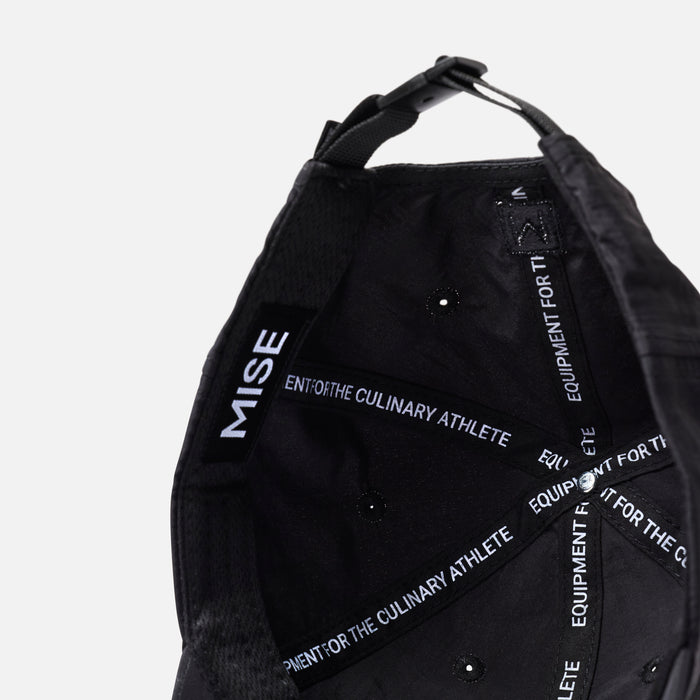 The Dad Cap gallery position 1 showing interior with black moisture-wicking fabric and MISE branded supportive taping