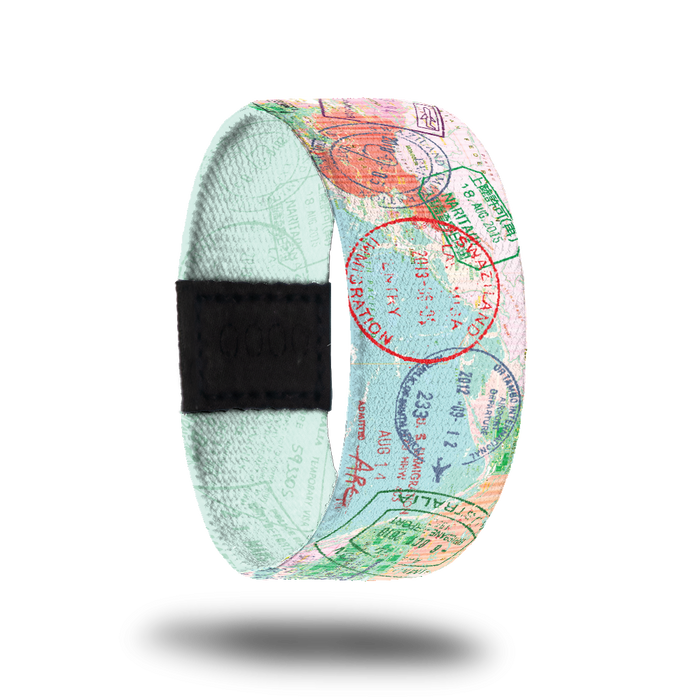 Outside Design of The Places You'll Go: light blue map background with varying passport stamps