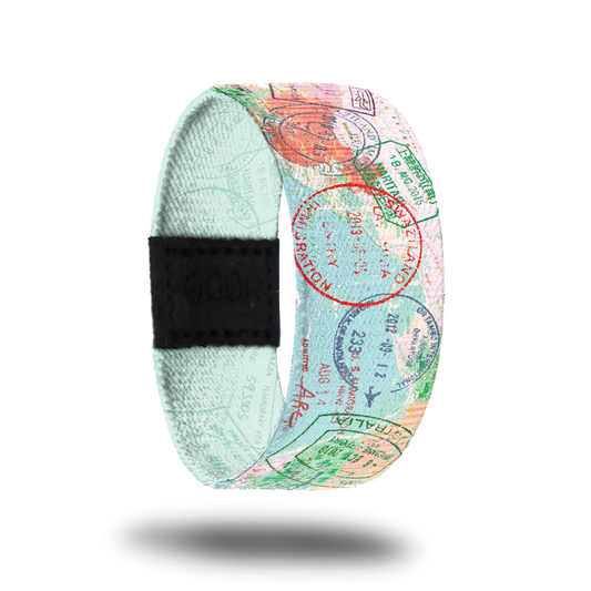 Outside Design of The Places You'll Go: light blue map background with varying passport stamps