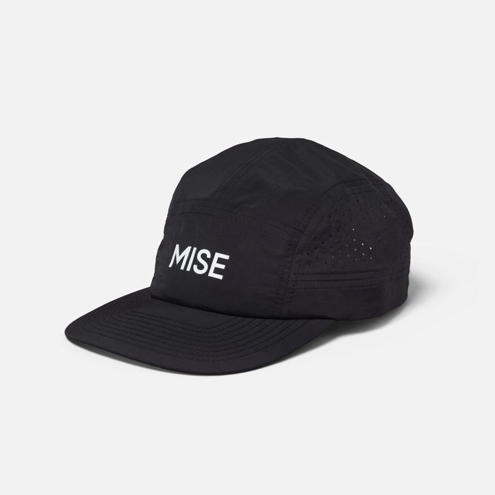 The Run Hat gallery position 1 showing black moisture-wicking 5-panel cap with white MISE logo side angle view