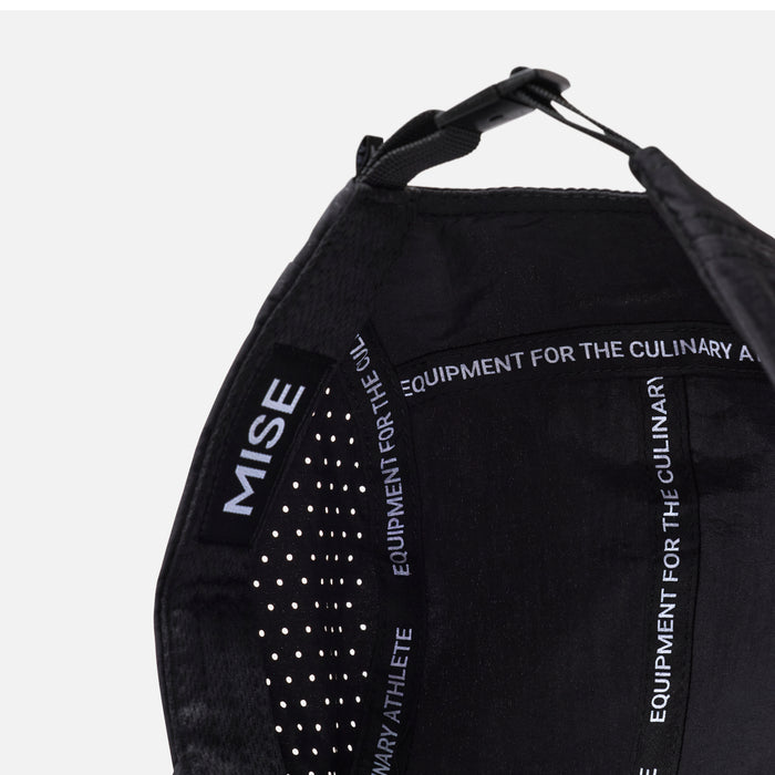 The Run Hat gallery position 1 showing black interior with moisture-wicking panels and MISE branded tape details