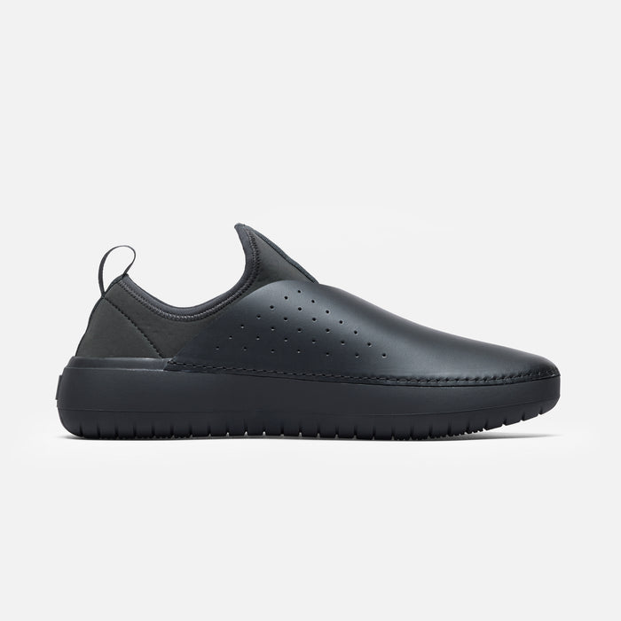 MISE black kitchen shoe medial view on a light gray background