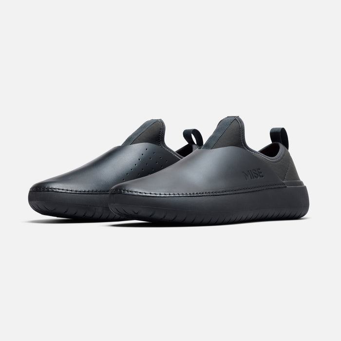 MISE Standard 2 black slip-resistant kitchen shoes angled lateral view on light gray background