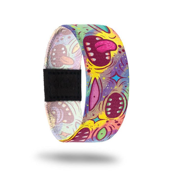 Outside design for True To You. Colorful background with animated drawn mouths and eyes spread along the design.