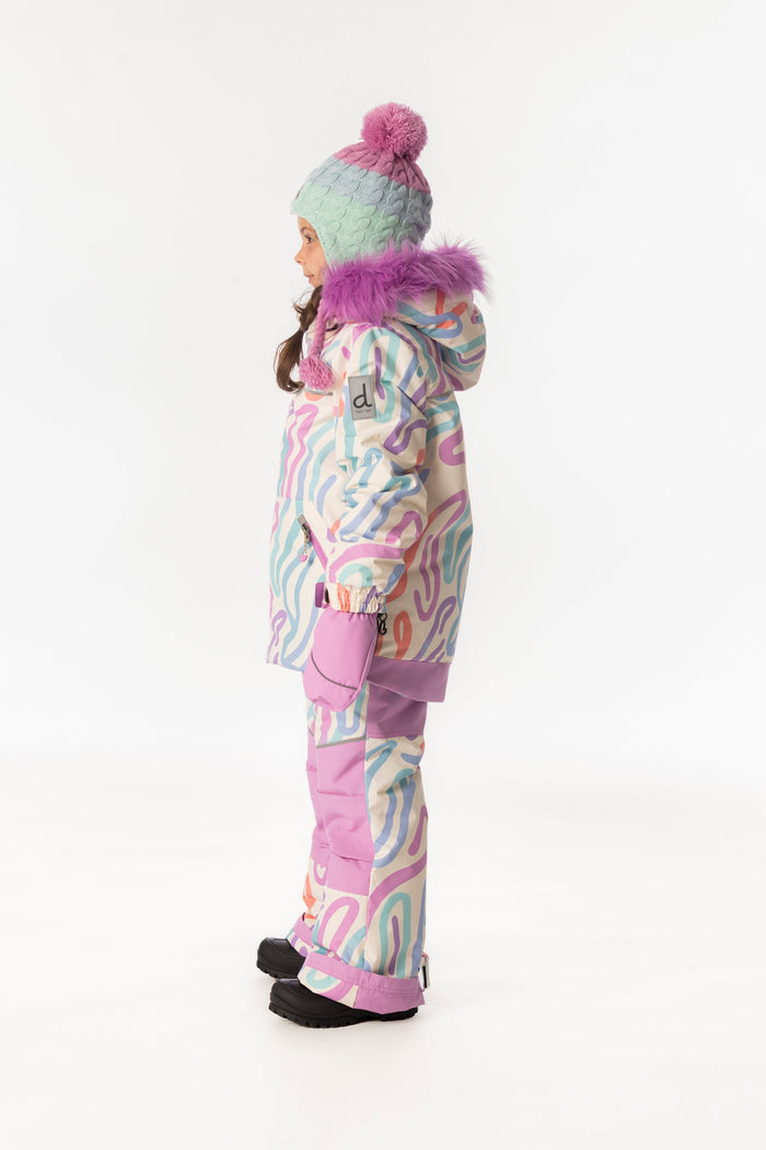 Child wearing the multicolored line print Deux par Deux DISCOVER snowsuit, side view