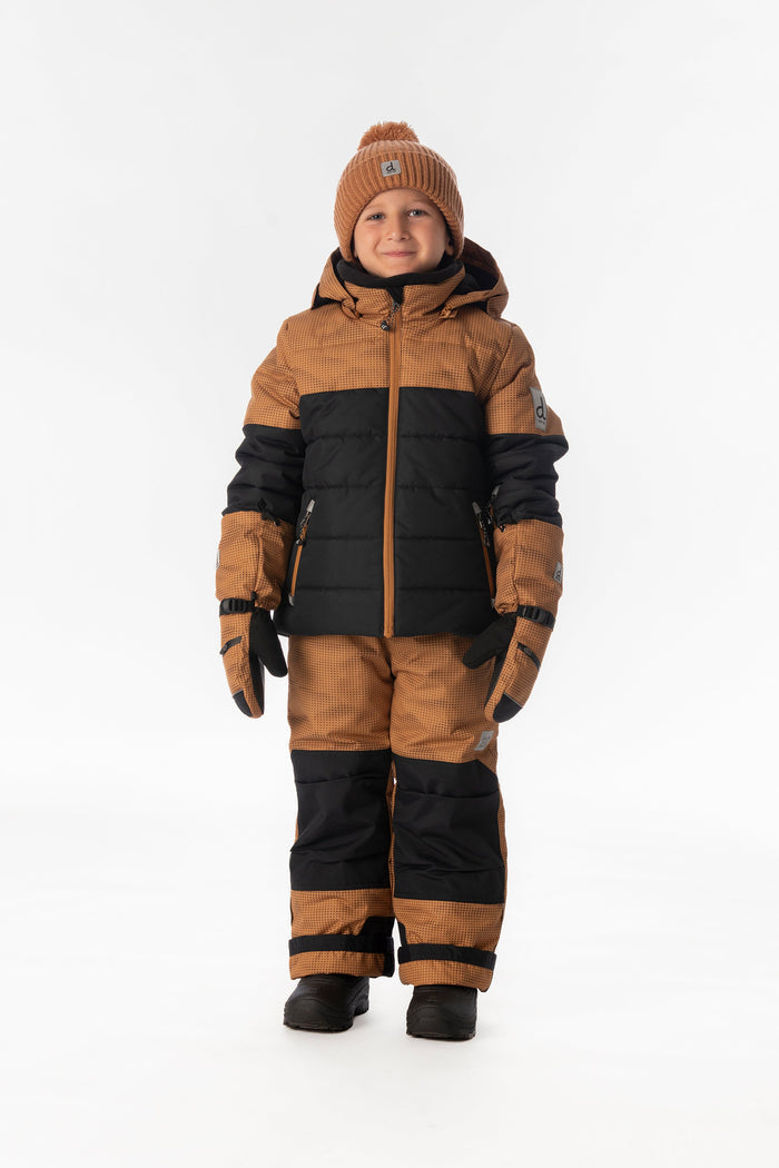 Child wearing the brown and black Deux par Deux PLAY snowsuit, full-length front view