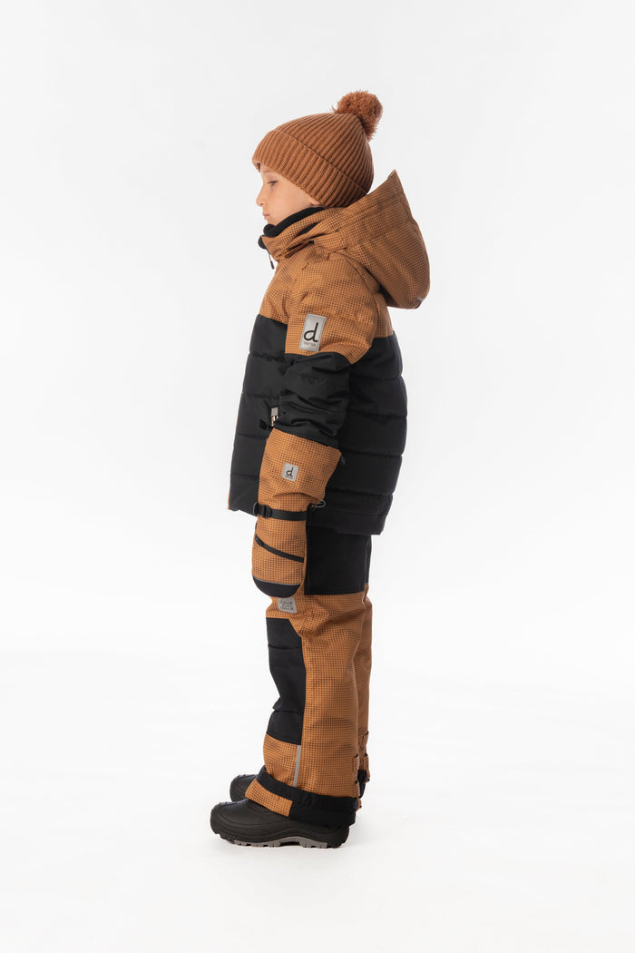 Child wearing the brown and black Deux par Deux PLAY snowsuit, side view